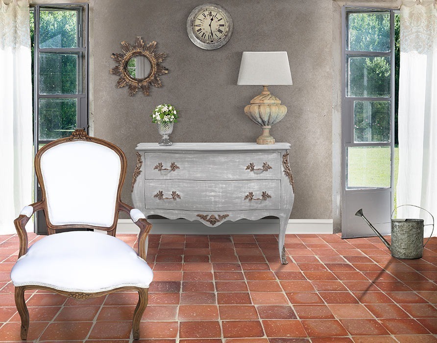 chic French countryside scene with chest of weathered gray Louis XV and Louis XV style chair white and natural wood
